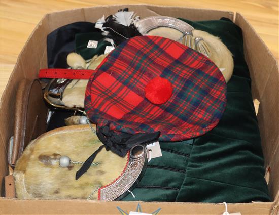 Scottish Highland costume, comprising three fur-covered sporrans, a leather sporran, a tweed day jacket, three dress jackets